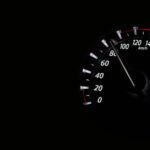 Speedometer reading showing speed in km/h on a dark background.